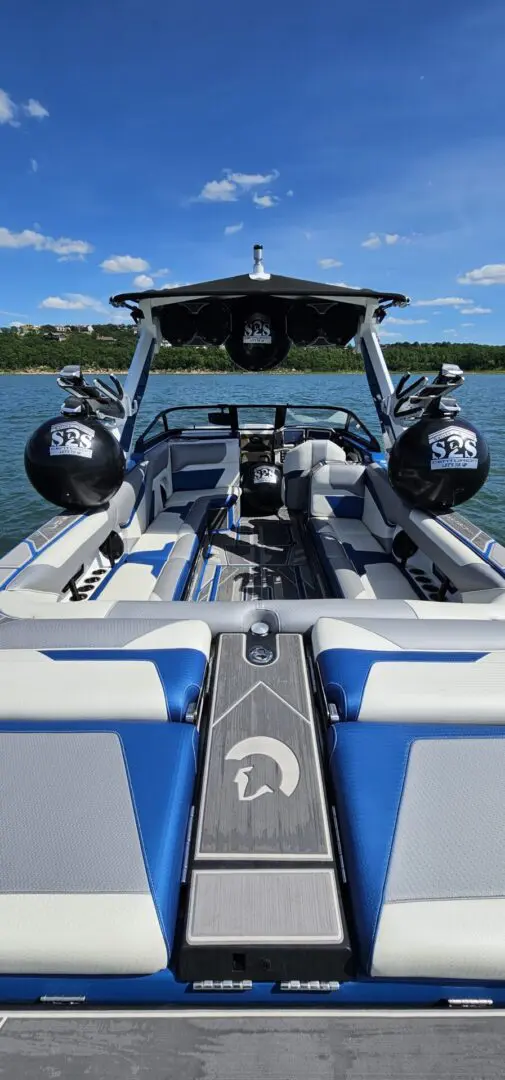 A boat with two engines on the back of it.